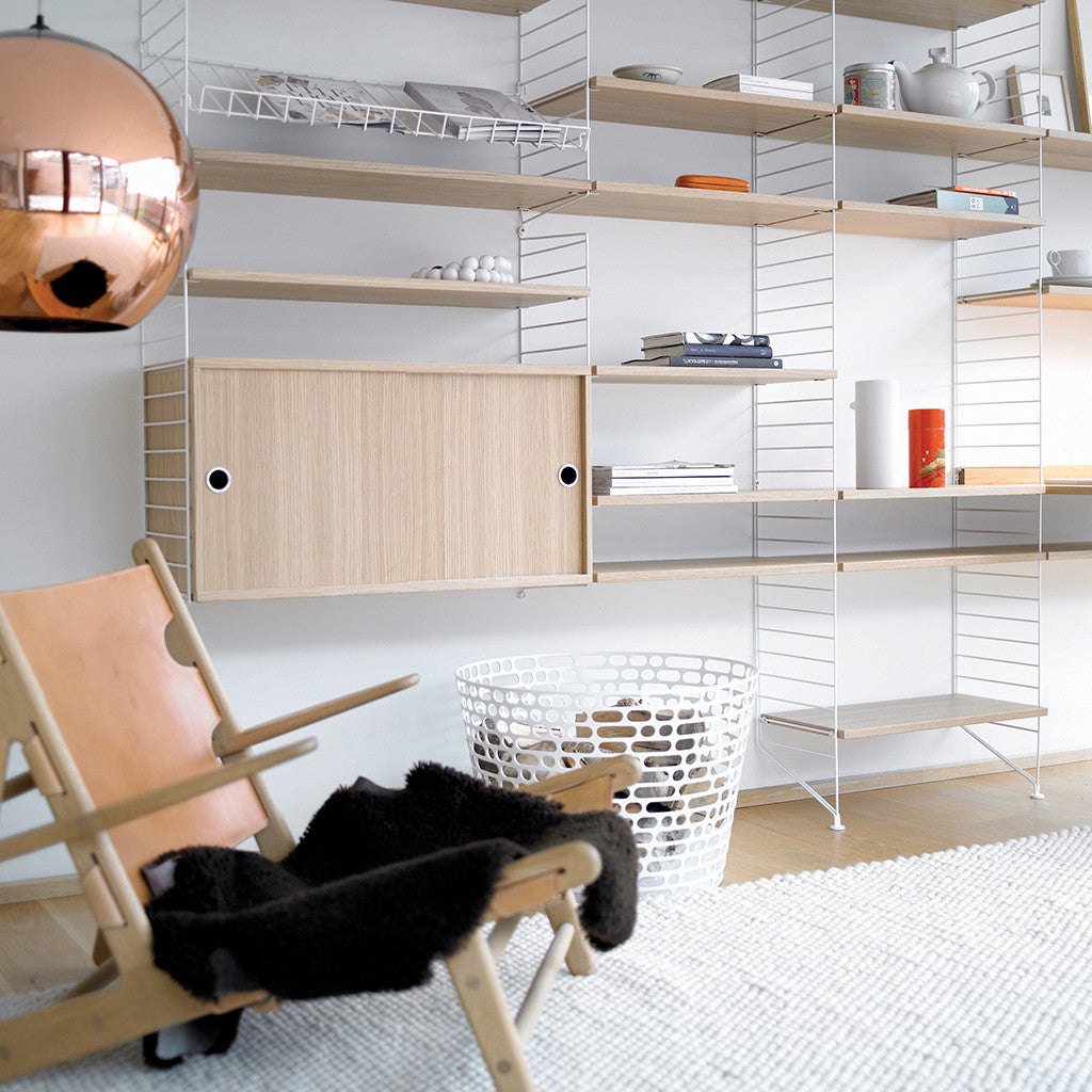 String Shelving - Sliding Door Cabinet.